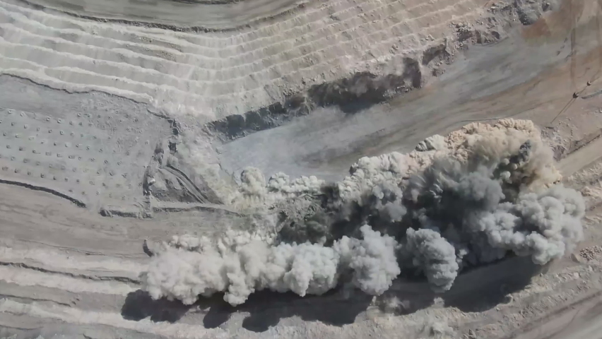 Chuquicamata, the world's largest copper mine quarry, Calama, Chile. View of a powerful explosion at a quarry. (aerial photography) Royalty-Free Stock Footage #1059176849