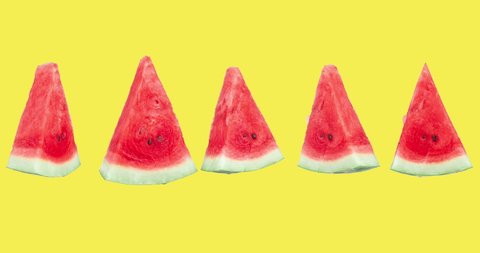 fresh watermelon slices animated on a yellow background close-up