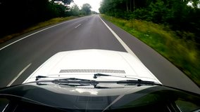 Video footage in 4K / UHD from a on-board-camera on the roof of a car on a country road in Germany