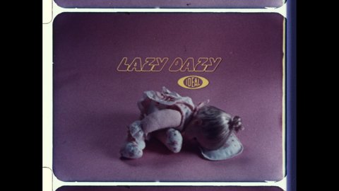 1970s USA Lazy Dazy Doll by Ideal Toy Company. Young Girl in Frock Scolds Baby Doll and Spanks her for Bad Behavior.  4K Overscan of Archival 16mm Film of Vintage Television Commercial