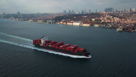 Aerial view of Cargo ship. Large container ship at sea - Aerial top down.