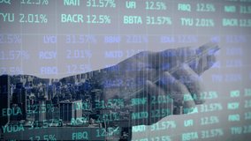 Digital composite video of Stock market data processing over hands using smartphone against cityscape. Global economy stock market and Global networking concept - Powered by Shutterstock - Get 15% off with code: PIKWIZARD15