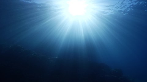 sun ray and sun beam scenery underwater waves on surface of water slow ocean scenery backgrounds