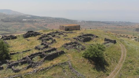 Coast of the Teveriad Sea. Ruined hill Horvat (Hirbet) Kanaf. Ruins of a settlement in the Golan Heights (Israel), that existed from the Helenistic to the Late Arab period (Mazrat Kanaf). 