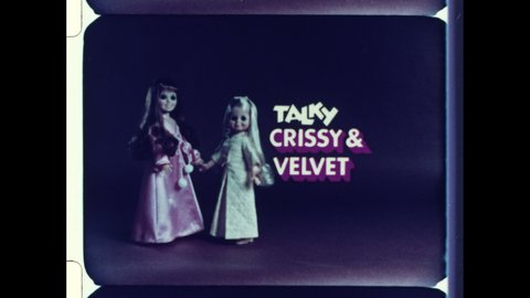 1970s USA Velvet & Crissy Doll by Ideal Toy Corporation. Young Girl Brushes Hair of Pull String Talking Doll.  4K Overscan of Archival 16mm Film of Vintage Television Commercial Advertisment