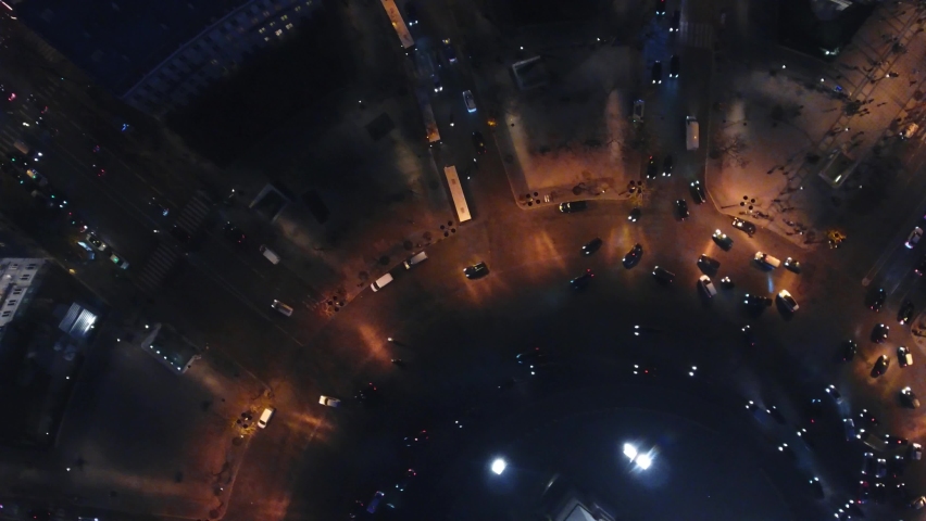 Aerial drone vertical view of Arc de Triomphe Triumphal Arch traffic intersection, Paris city attractions in France at night Royalty-Free Stock Footage #1059280709