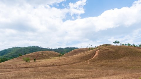 Golden Grass or Bald Hill mountain, scenic park in Ranong, Thailand; zoom in - Time Lapse