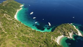 Aerial drone video of beautiful paradise turquoise sea sandy beach and bay of Gidaki accessible by short hiking in beautiful Ionian island of Ithaki or Ithaca, Greece