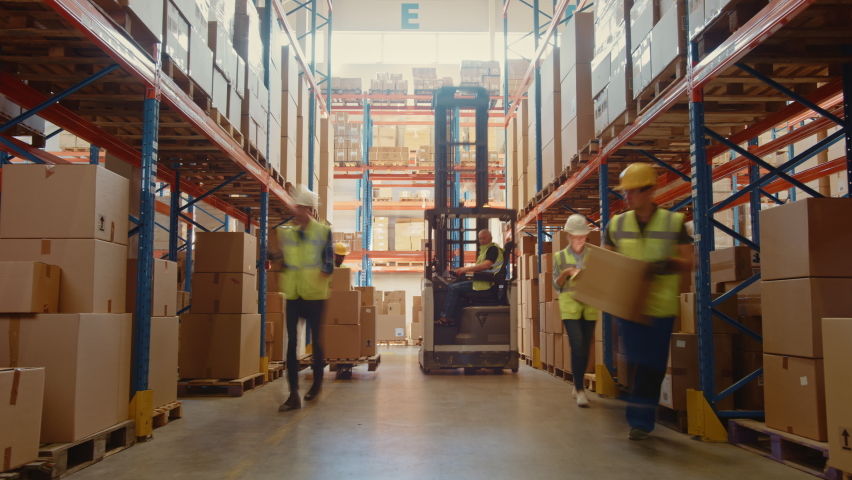 Time-Lapse: Retail Warehouse full of Shelves with Goods in Cardboard Boxes, Workers Scan and Sort Packages, Move Inventory with Pallet Trucks and Forklifts. Product Distribution Logistics Center | Shutterstock HD Video #1059312542