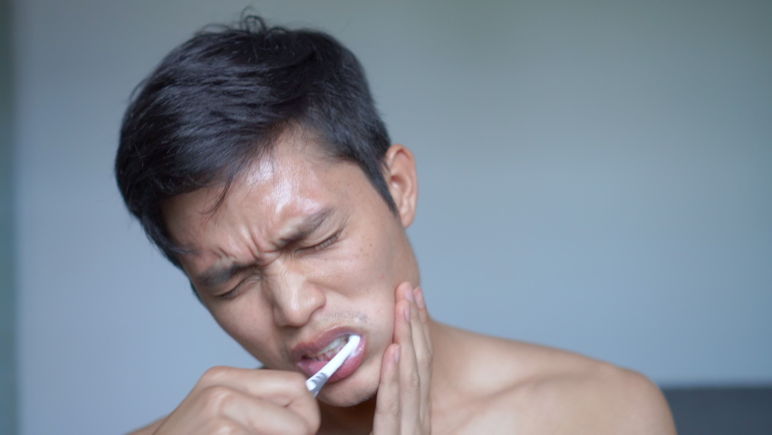 Close up young man suffering from toothache, health care concept Videos ...