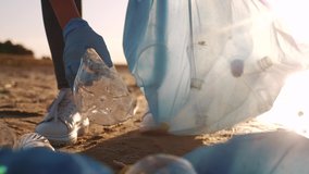 people collecting trash volunteer a teamwork. people group happy family collects garbage plastic trash waste bottles. ecology environmental happy trash family teamwork volunteer awareness pollution - Powered by Shutterstock - Get 15% off with code: PIKWIZARD15