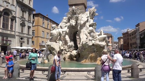 Rome, Piazza Navona, tourist at Fontana dei Quattro Fiumi. Rome Italy may 2019