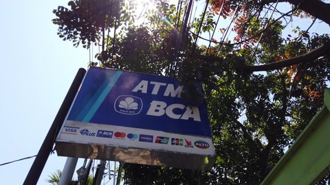 Bandung / Indonesia - August 25, 2020: Established Shot of Outdoor Bank BCA ATM Banner
