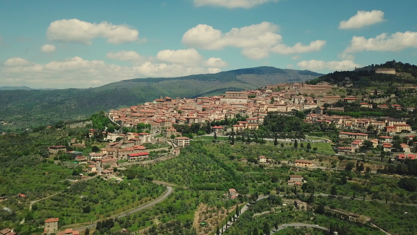 Old town in hilly landscape / Monteriggioni, Umbria, Italy