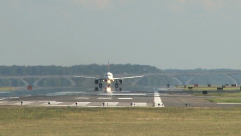 airplane landing closeup slowly background 