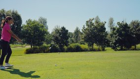 Woman playing golf on sunny day / Prato, Florence, Italy - Powered by Shutterstock - Get 15% off with code: PIKWIZARD15