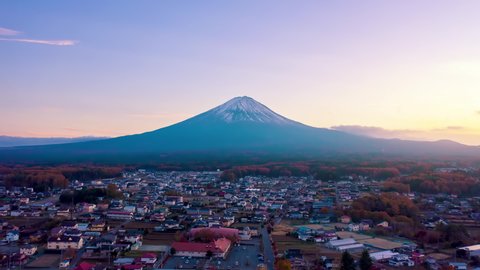 Aerial view Hyper lapse 4k footage of Mount Fuji on sunset at Kawaguchiko, Yamanashi, Japan. mt. fujisan hyperlapse by drone.