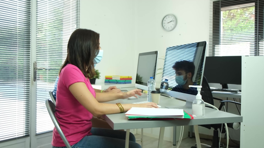 Students in high school classroom wearing protection mask against pandemic virus  | Shutterstock HD Video #1059442700
