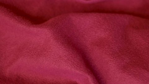 Soft Fleece Texture Of Red Crimson Pink Fabric, Warm Cozy Plaid, Bedspread. Background Made of Soft Red Pink Fleece Material. 
Textile Factory. 
