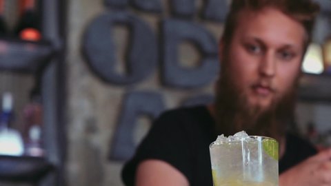 Hipster Barman Preparing A Mojito In A Cocktail Bar.