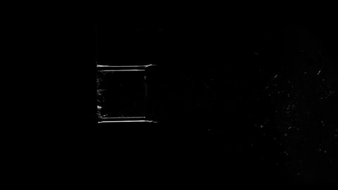 Effect of a window glass breaking from a brick on a black screen from the Fragment collection - Glass VFX Video Element, Vertical.