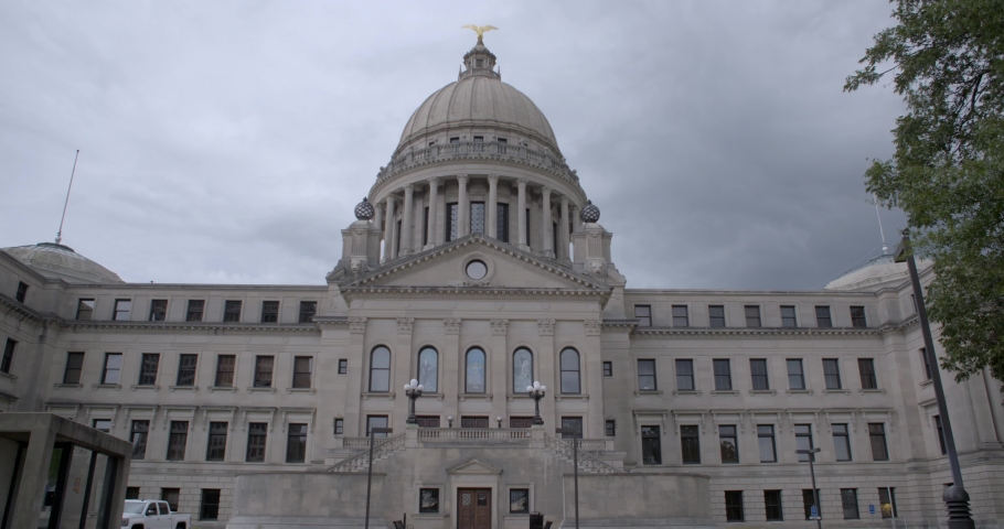 Time-lapse, wide: Stormy skies over the Mississippi State Capitol building. Jackson, MS.