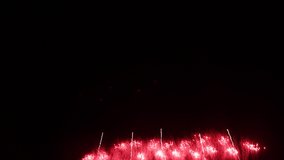 close up of colourful abstract futuristic fireworks show night sky