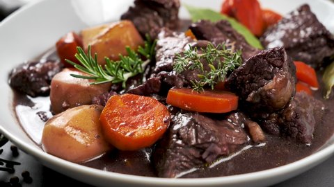 beef stew with carrot, potato and wine sauce. boeuf bourguignon.