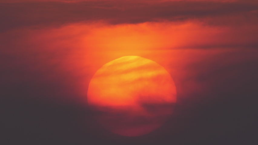 Orange Sunset/sunrise in close-up with clouds