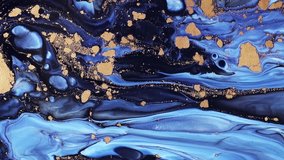 Fluid art drawing video, trendy acryl texture with flowing effect. Liquid paint mixing backdrop with splash and swirl. Detailed background motion with blue, golden and navy blue overflowing colors.