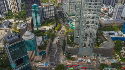 day time singapore cityscape downtown traffic street crossroad aerial panorama 4k timelapse
