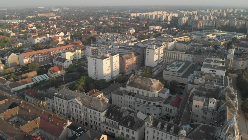 Aerial / drone footage of a theater in downtown Debrecen, second largest city and a major cultural center of Hungary, located in the Northern Great Plain region also the seat of Hajdú-Bihar county
