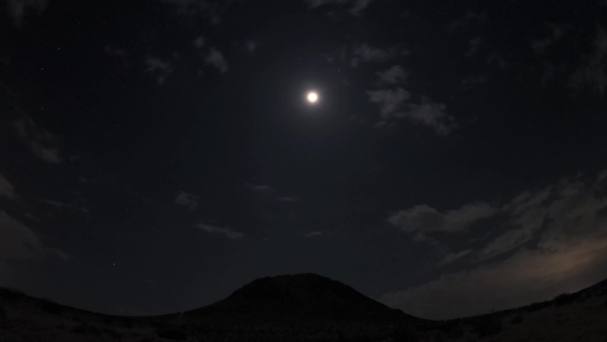 Night Timelapse of Moon and Clouds in Mojave Desert Over Silhouette Mountain