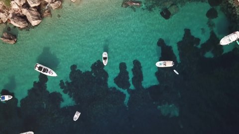 IBIZA, SPAIN - SEPTEMBER 25, 2020: Ibiza boat party with turquoise water