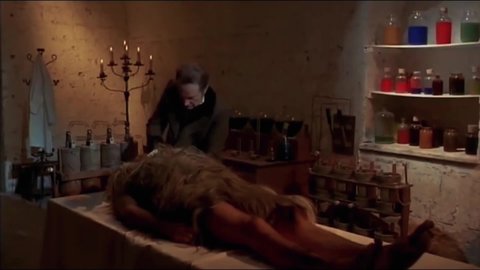 CIRCA 1974 - In this horror film, Dr. Frankenstein (Rossano Brazzi) conducts an experiment to bring a caveman back to life using electricity.