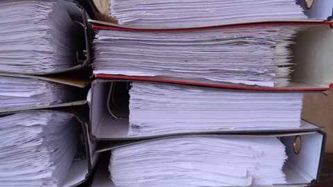 Close-up papers and files in archives of business financial documents