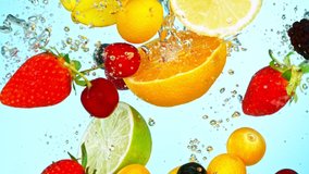 Super Slow Motion Shot of Fresh Fruits with Splashing Water Isolated on White Blue Background. Filmed on high speed cinema camera at 1000fps. - Powered by Shutterstock - Get 15% off with code: PIKWIZARD15