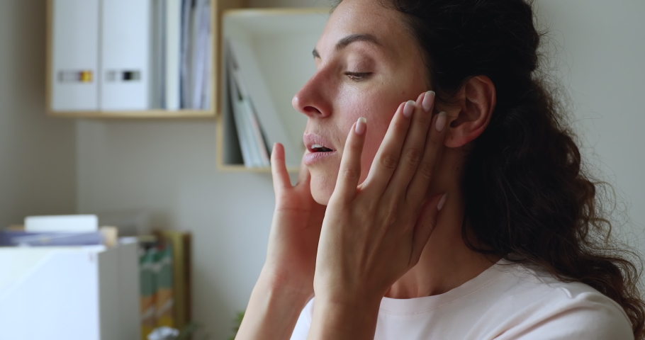Close up stressed woman make breath practice exercises, reducing getting rid of negative emotions, make her mental state at peace free from anxiety and angry, search inner harmony and balance concept | Shutterstock HD Video #1059626255