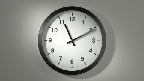 Clock Face in Time Lapse on White Wall in Office