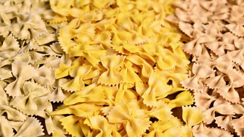 Various dry Italian pasta. With spinach, mushroom and lemon flavor. Slow frame motion and blurring of the picture. High quality 4k footage