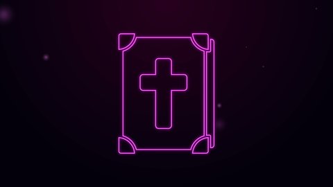Glowing neon line Holy bible book icon isolated on purple background. 4K Video motion graphic animation