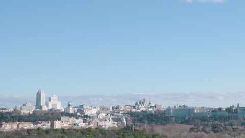 Madrid, Spain. City skyline with the Cathedral de la Almudena and Madrid Royal Palace.Panning right to left and zooming out
