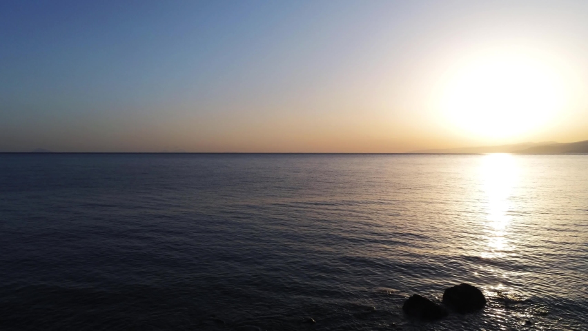 Aerial view of Mediterranean sunrise with beautiful colored sea. 