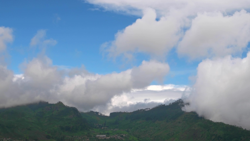View of mountains on the way to Lipton's Seat with fast moving clouds. 4K resolution speed up.