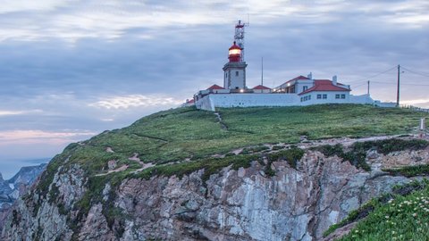 Rugged Coastline at Atlantic Ocean Morning, Foliage and Cabo Da Roca Lighthouse, of mainland Portugal