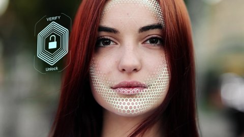 Face ID. Portrait of young woman using vr contact lens with futuristic augmented reality hologram.Face Detection. Technological 3d Scanning. Biometric Facial Recognition