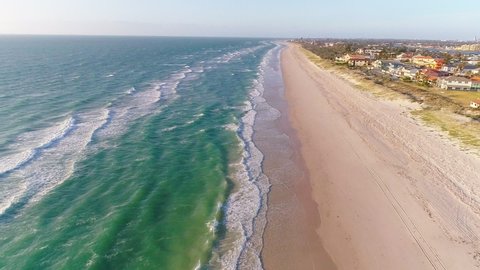 Wide angle aerial shot above Tennyson Beach in Adelaide, South Australia.