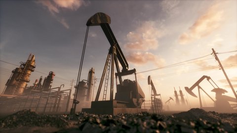 Working oil pump jack rig at sunset. Oil pump jack on the factory. Looping video
