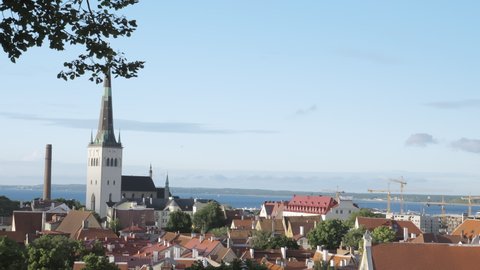 Tallinn.Estonia-July 1.2020: View of the houses downtown Tallinn Old Town in Estonia with the red roofs and the sky above.4K