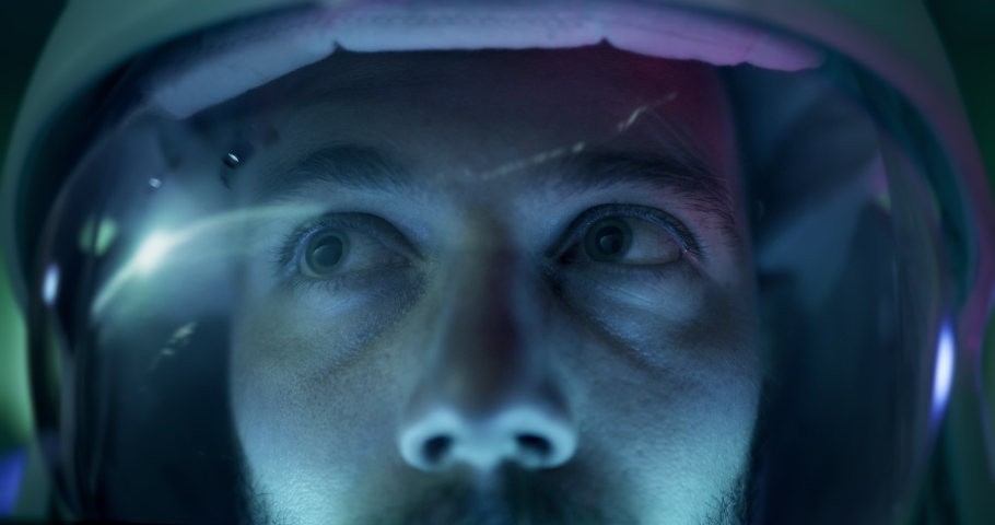 Astronaut Using Pioneering Technology For Space Travel Journey To Mars Exploration and Human Progress Concept Close Up Shot Of Young Astronaut Observing Sunrise Earth Red 8k